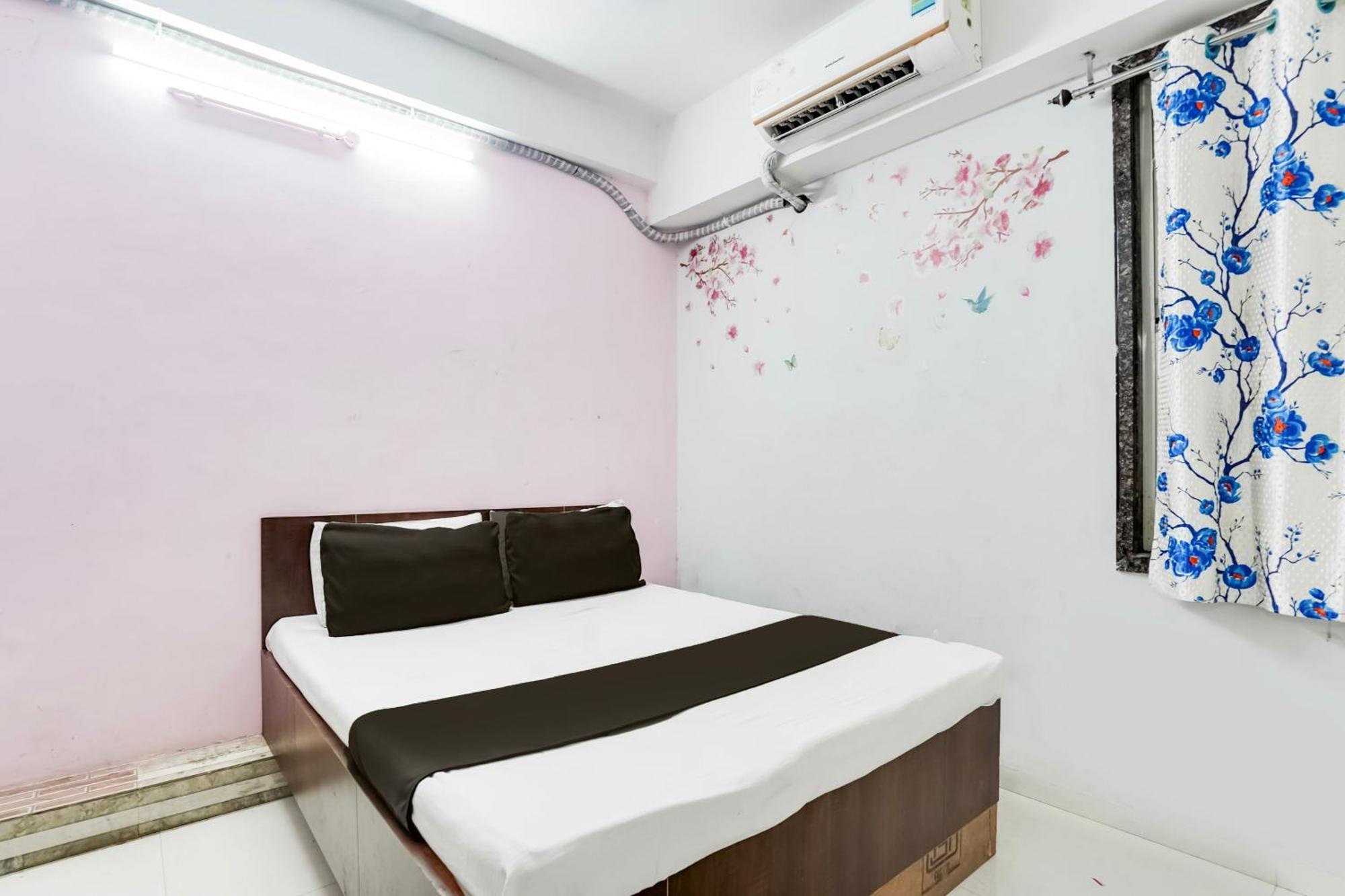 Hotel O Day Night Rooms Surat Bagian luar foto